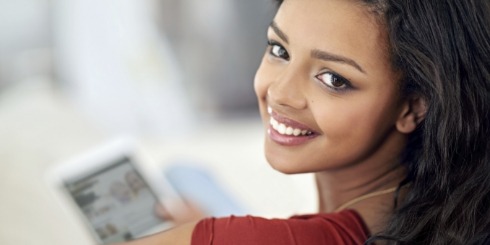 Woman with healthy smile thanks to nightguards for bruxism