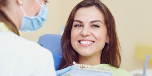 Smiling woman with veneers